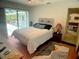 Comfortable bedroom with private access to the pool area at 6170 David Blvd, Port Charlotte, FL 33981