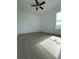 Bedroom with tile floors, a ceiling fan, and a window for natural light at 6219 Sweden Blvd, Punta Gorda, FL 33982