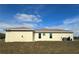 A well-maintained backyard complements the exterior of this inviting residence at 6372 Grove Blvd, Punta Gorda, FL 33982