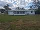 Exterior view of the back of the house at 710 Aqui Esta Dr, Punta Gorda, FL 33950