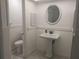 Bathroom featuring a toilet and modern-style sink at 710 Aqui Esta Dr, Punta Gorda, FL 33950