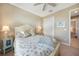 Bright bedroom with light walls, closet and coastal-themed decorations at 7346 Talon Bay Dr, North Port, FL 34287