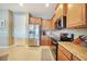 Well-equipped kitchen with stainless steel appliances and ample counter space, perfect for preparing meals at 7346 Talon Bay Dr, North Port, FL 34287