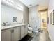 Bathroom with a double sink vanity, updated fixtures, and a separate enclosed shower at 8858 Tuscany Isles Dr, Punta Gorda, FL 33950