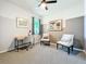 Bedroom featuring carpet flooring, a ceiling fan, and neutral-colored walls at 8858 Tuscany Isles Dr, Punta Gorda, FL 33950