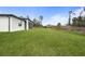 Expansive backyard provides ample space for outdoor activities and landscaping opportunities at 1022 S Lavina St, North Port, FL 34286
