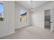 An additional bonus room with a window and doorway leading to a small sink area at 1022 S Lavina St, North Port, FL 34286