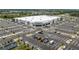 An aerial view of a Costco store and a large parking lot full of cars and construction equipment at 1022 S Lavina St, North Port, FL 34286