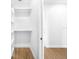 Walk-in closet with built-in shelving for optimal storage and organization at 1022 S Lavina St, North Port, FL 34286