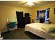 Simple bedroom with a desk, dresser, and comfortable bed at 21422 Mallory Ave, Port Charlotte, FL 33952