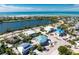 Aerial view of a house under construction in a neighborhood at 10009 Gasparilla Pass Blvd, Boca Grande, FL 33921