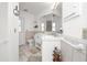 Clean bathroom with double vanity and tile flooring at 256 Coblentz St, Port Charlotte, FL 33954