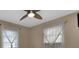 Well-lit bedroom with ceiling fan and neutral wall colors at 256 Coblentz St, Port Charlotte, FL 33954