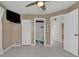 Bright bedroom with tiled floors, a large closet, and en-suite bathroom at 256 Coblentz St, Port Charlotte, FL 33954