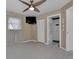 Bright bedroom with tiled floors, a large closet, and en-suite bathroom at 256 Coblentz St, Port Charlotte, FL 33954