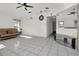 Bright living room featuring tile floors and a comfy sofa at 256 Coblentz St, Port Charlotte, FL 33954