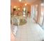Bright sunroom with tile floors and access to the outdoors at 256 Coblentz St, Port Charlotte, FL 33954
