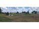 Scenic view of a golf course with water features and lush landscaping at 443 Madrid Blvd, Punta Gorda, FL 33950
