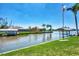 Peaceful canal view with boat docks and neighboring houses at 15706 Viscount Cir, Port Charlotte, FL 33981