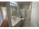 Clean bathroom with tub shower and vanity at 2307 N Biscayne Dr, North Port, FL 34291