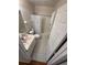 Bathroom with shower/tub combo and vanity at 2307 N Biscayne Dr, North Port, FL 34291