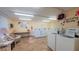 Well-equipped laundry room with multiple washers and dryers at 2437 Harbor Blvd # 219, Port Charlotte, FL 33952