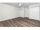 Spacious bedroom with ample closet space and wood-look flooring at 1080 Bal Harbor Blvd # 1C, Punta Gorda, FL 33950