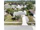 Charming home with a well-maintained front yard and a concrete driveway at 13468 Romford Ave, Port Charlotte, FL 33981