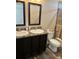 Clean bathroom with double vanity and walk-in shower at 1391 Flamingo Dr, Englewood, FL 34224