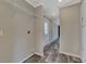 Laundry room with built-in shelving and exterior access at 1391 Flamingo Dr, Englewood, FL 34224