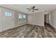 Living room with wood-look floors and neutral walls at 1391 Flamingo Dr, Englewood, FL 34224