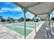 Community shuffleboard courts under covered walkways at 1391 Flamingo Dr, Englewood, FL 34224