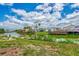 Community waterfront view with homes and lush landscape at 1391 Flamingo Dr, Englewood, FL 34224