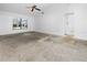 Main bedroom with ceiling fan and ample space for furniture at 104 Park Forest Blvd, Englewood, FL 34223