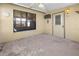 Covered patio with exterior door and window at 104 Park Forest Blvd, Englewood, FL 34223