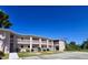 Two-story condo building with balconies and parking at 179 Boundary Blvd # 7, Rotonda West, FL 33947