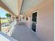 Condo hallway with access to individual units at 179 Boundary Blvd # 7, Rotonda West, FL 33947
