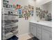 Elegant bathroom featuring double vanity and wall art at 20450 Revival Ln, Venice, FL 34293