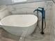 Modern bathroom with soaking tub and walk-in shower at 1019 Schooner Ln, Englewood, FL 34224