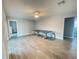 Bright dining room featuring wood flooring and a farmhouse table at 1019 Schooner Ln, Englewood, FL 34224