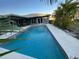 Inviting swimming pool in a spacious backyard setting at 1019 Schooner Ln, Englewood, FL 34224
