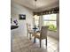Bright breakfast nook with a table, chairs, and view outside, creating a cozy dining space at 15001 Appleton Blvd, Port Charlotte, FL 33981
