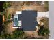 Overhead view of single Gathering home with pool and backyard at 9660 Miami Cir, Port Charlotte, FL 33981