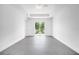 Spacious bedroom with sliding glass doors leading to the backyard at 147 Ingram Rd, Rotonda West, FL 33947