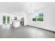 Modern kitchen with stainless steel appliances and white shaker cabinets at 147 Ingram Rd, Rotonda West, FL 33947