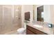 Clean bathroom with granite vanity and walk-in shower at 10309 Coral Landings Ct # 101, Placida, FL 33946