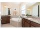 Double vanity bathroom with soaking tub and shower at 10309 Coral Landings Ct # 101, Placida, FL 33946