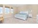 Bedroom with light-colored furnishings and plenty of natural light at 10309 Coral Landings Ct # 101, Placida, FL 33946