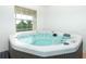 Relaxing hot tub with window views at 10309 Coral Landings Ct # 101, Placida, FL 33946