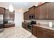 Modern kitchen with granite countertops and stainless steel appliances at 10309 Coral Landings Ct # 101, Placida, FL 33946